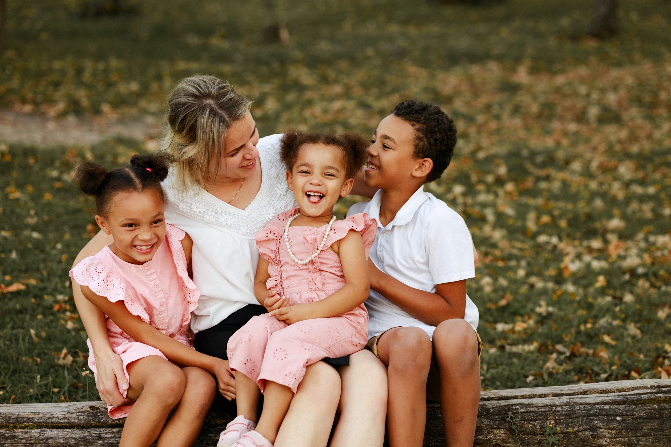 Family laughing together outdoors