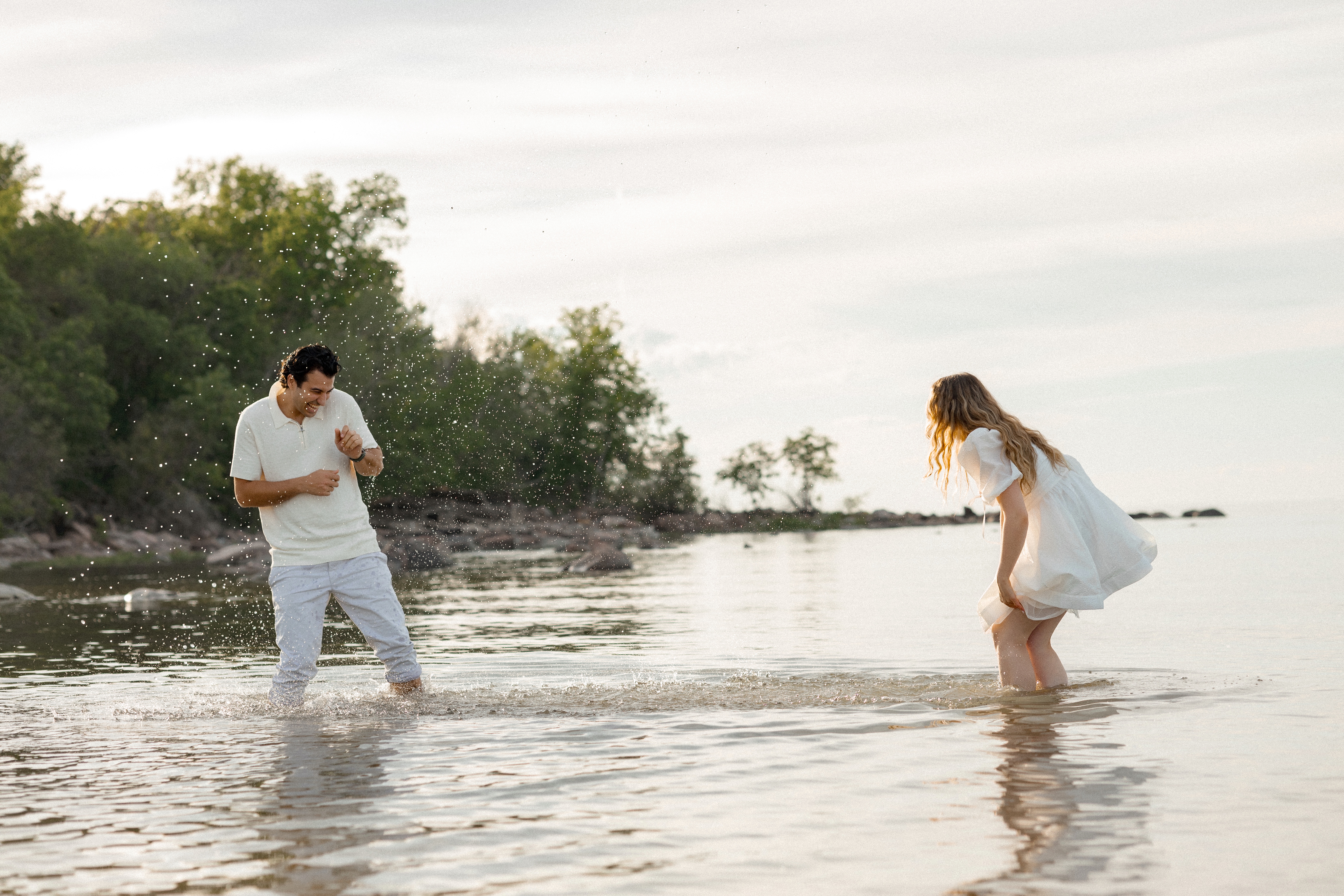 Robert and Liza walking together during their engagement photographs.